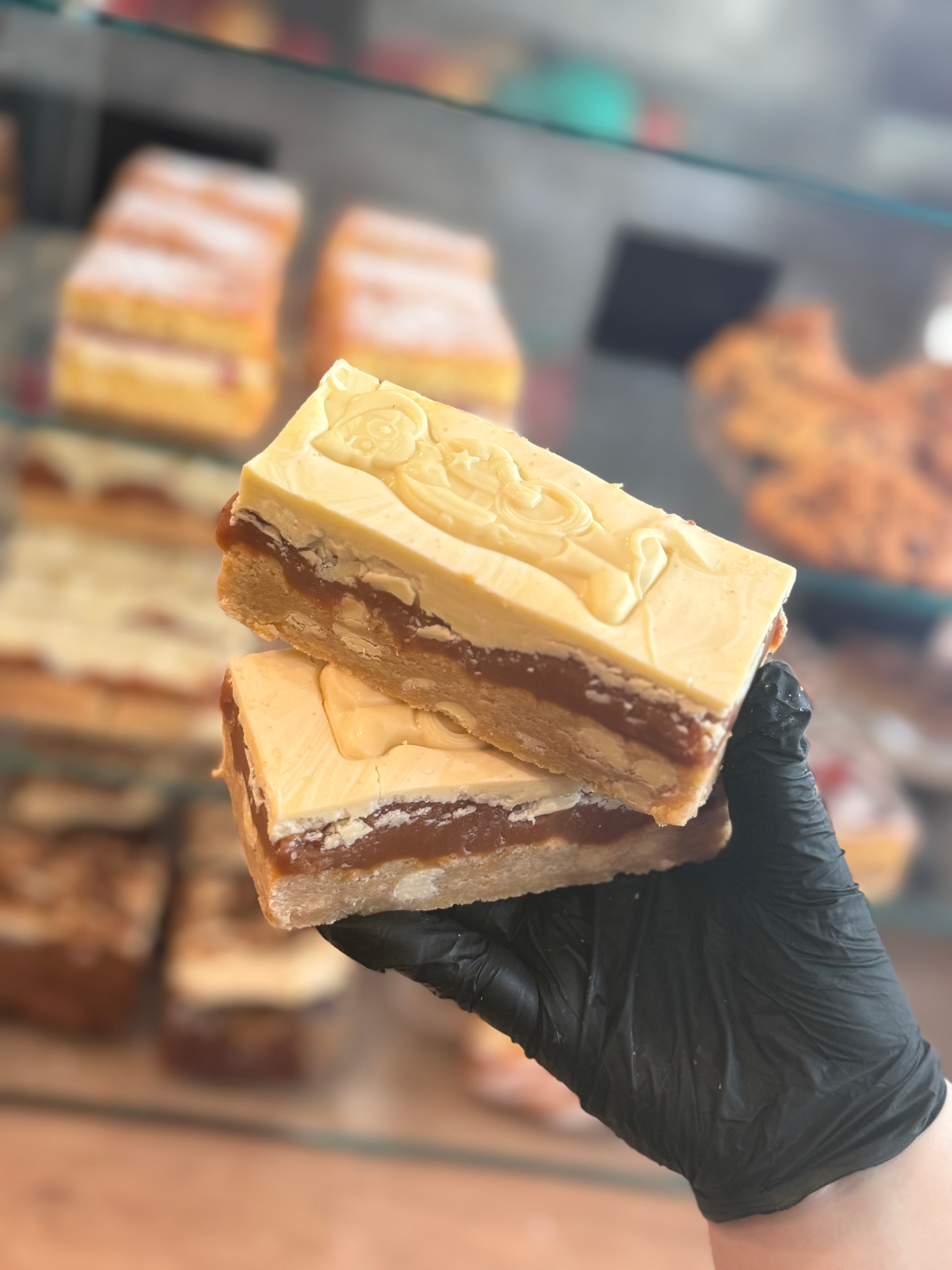 Milky Bar Millionaire Cookie slice